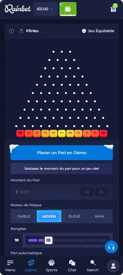 Plateau de Plinko réglé sur un niveau de risque moyen, affichant des multiplicateurs de 0,4x à 22x dans les emplacements inférieurs
