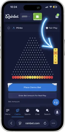 Plinko ball settled in bottom slot displaying winning multiplier value
