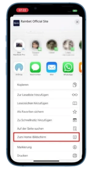 Le menu de partage iOS ouvert sur la plateforme Rainbet, avec l'option Sur l'écran d'accueil mise en évidence par un encadré rouge.
